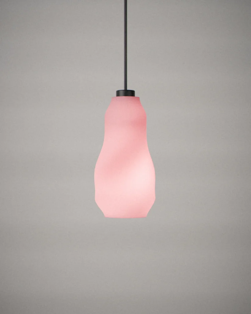 Blade, lit, on a pale grey wall
