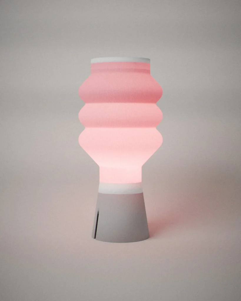 Bubbles, lit, on a pale grey wall