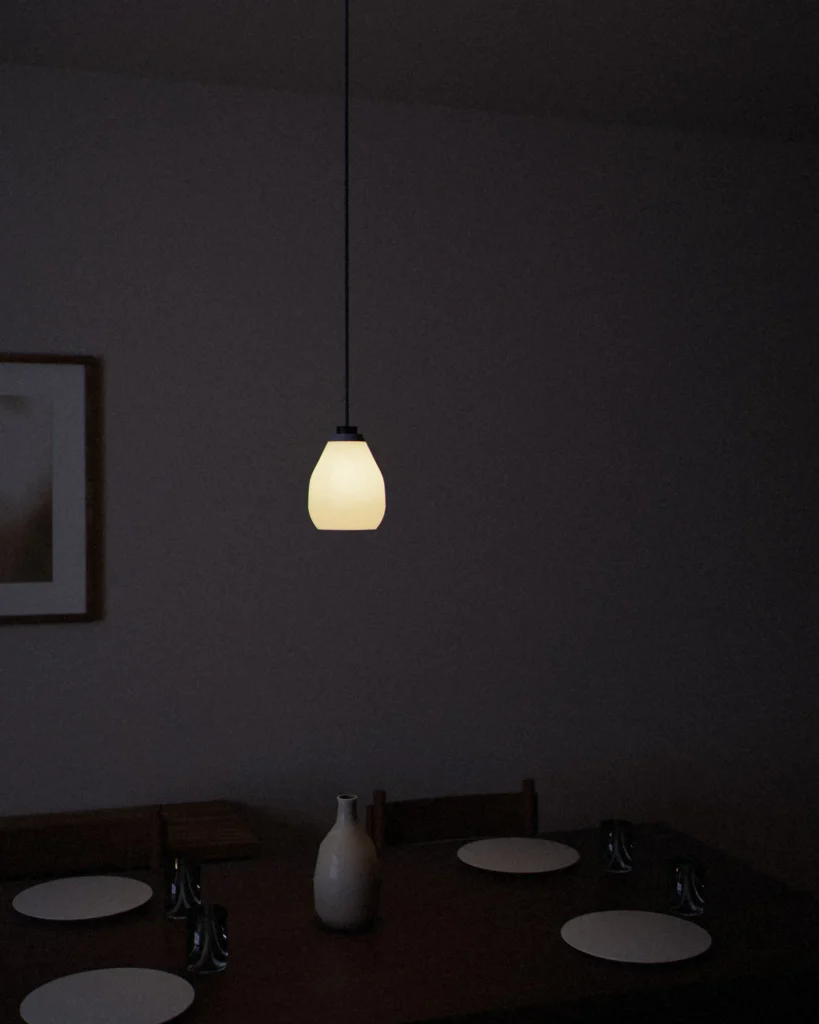 Cocoon lit in a furnished room in the evening