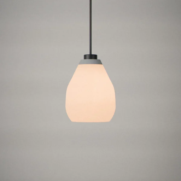 Cocoon, lit, on a pale grey wall