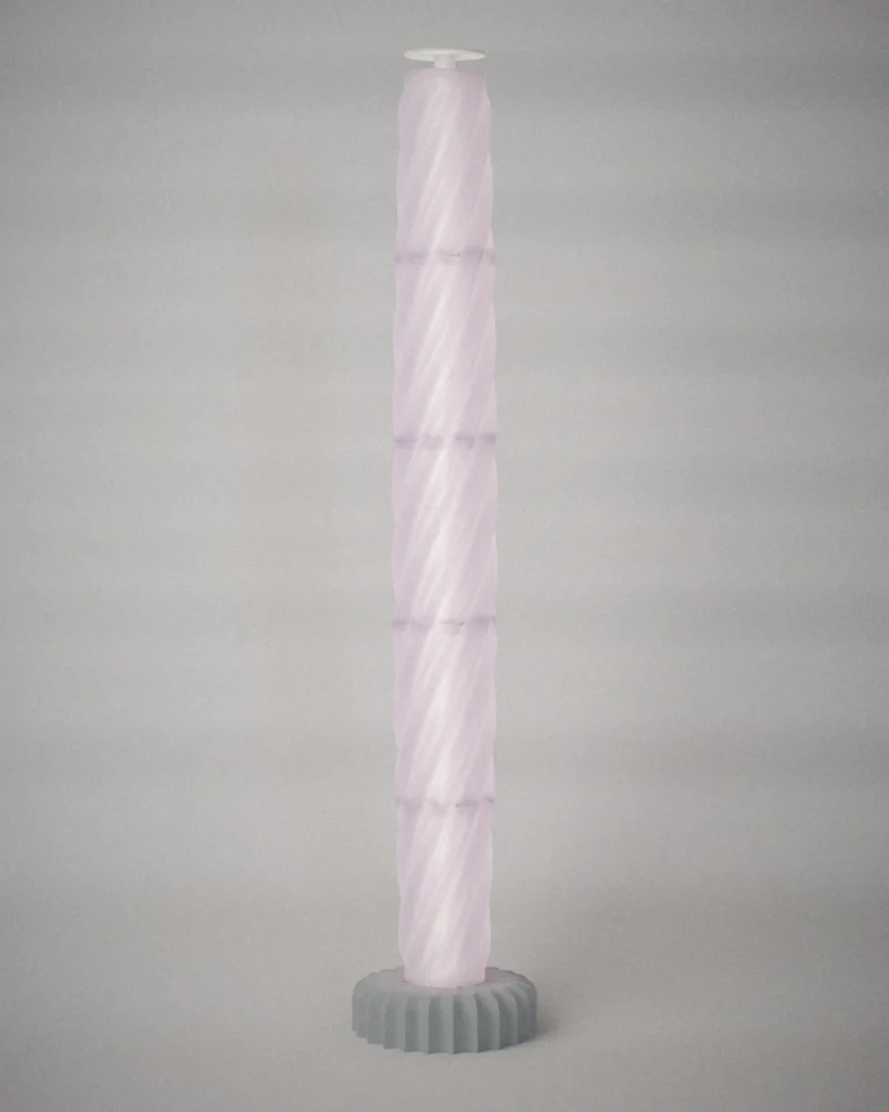 Column, lit, on a pale grey wall