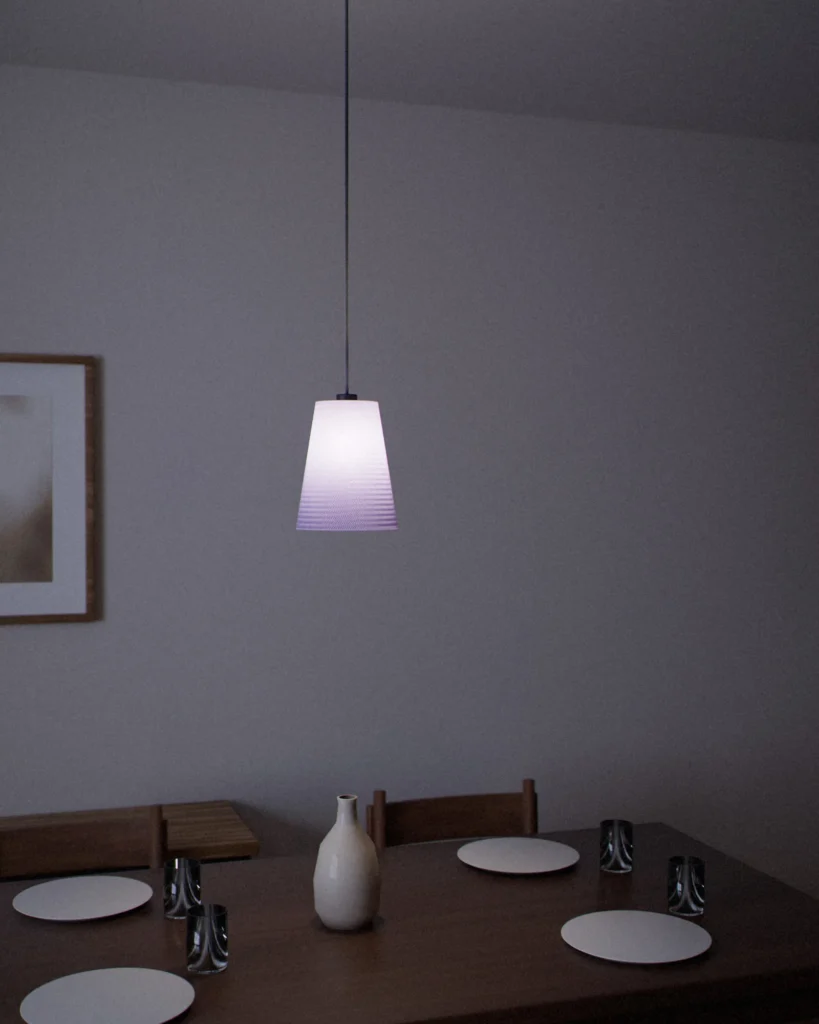 Cone lit in a furnished room in the evening