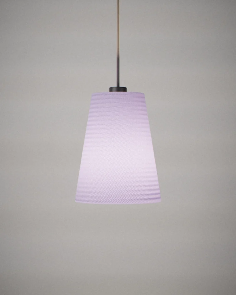 Cone, lit, on a pale grey wall