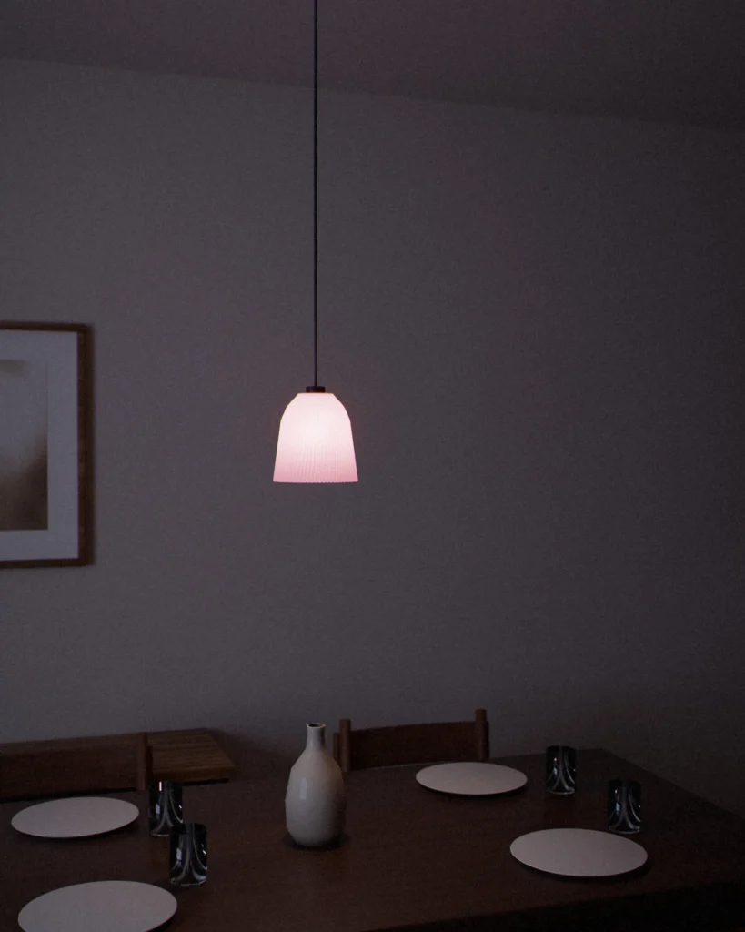 Cup lit in a furnished room in the evening