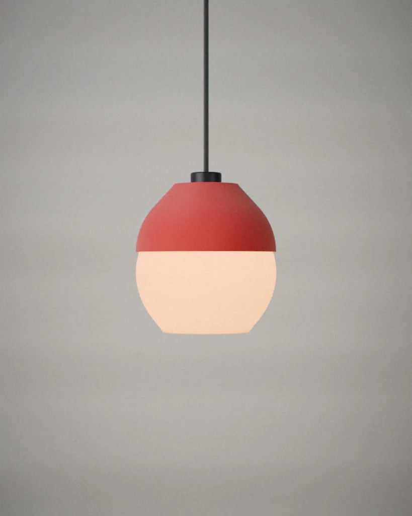 Dome, lit, on a pale grey wall