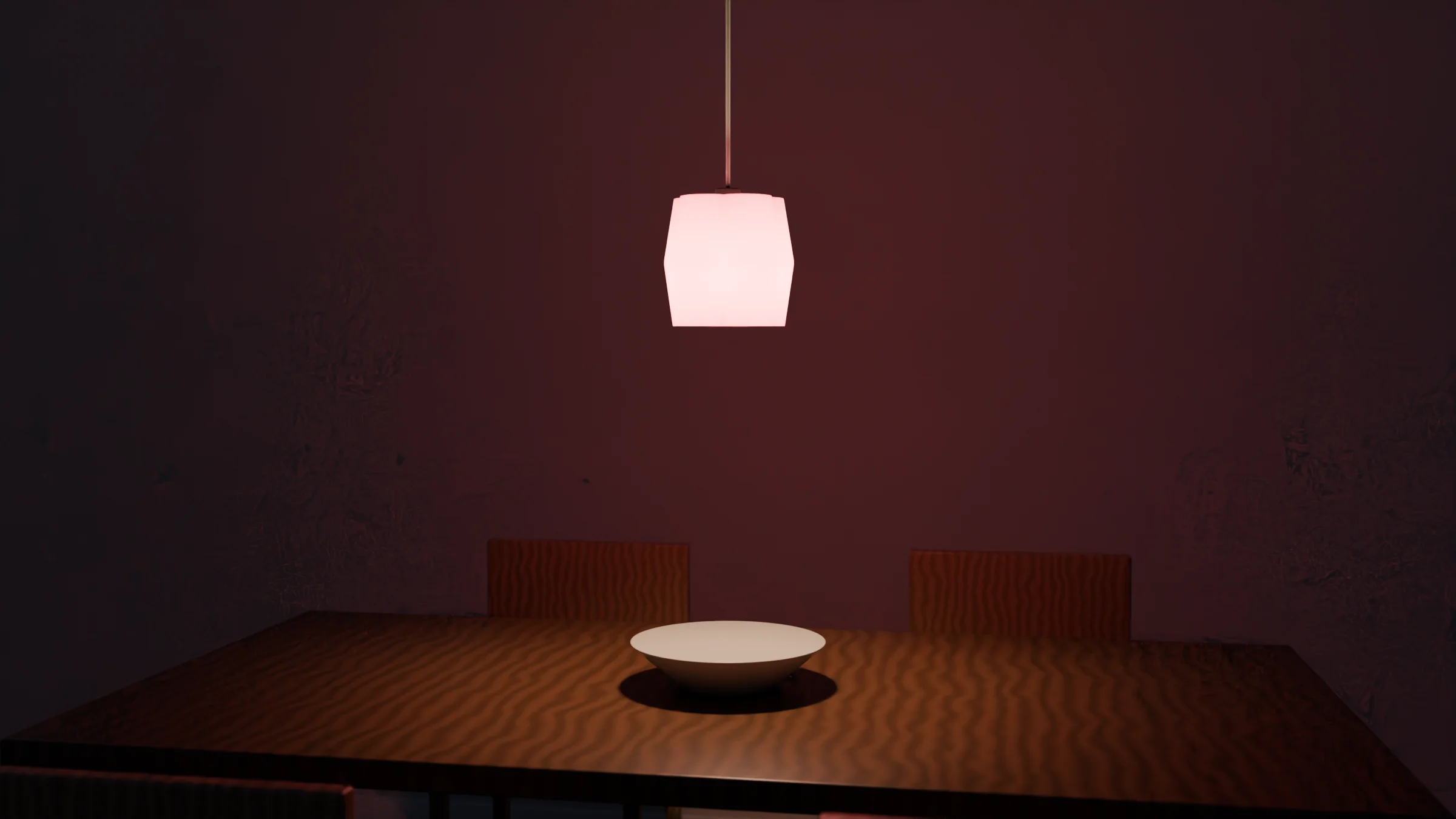 Kikyō pendant light hanging over a dining table