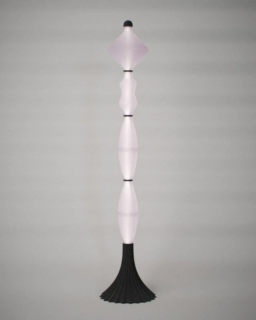 Finial, lit, on a pale grey wall