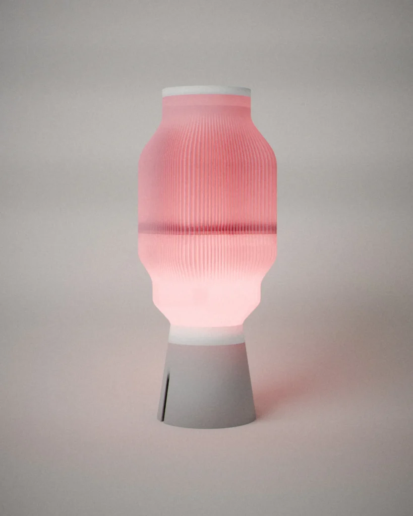 Fins, lit, on a pale grey wall