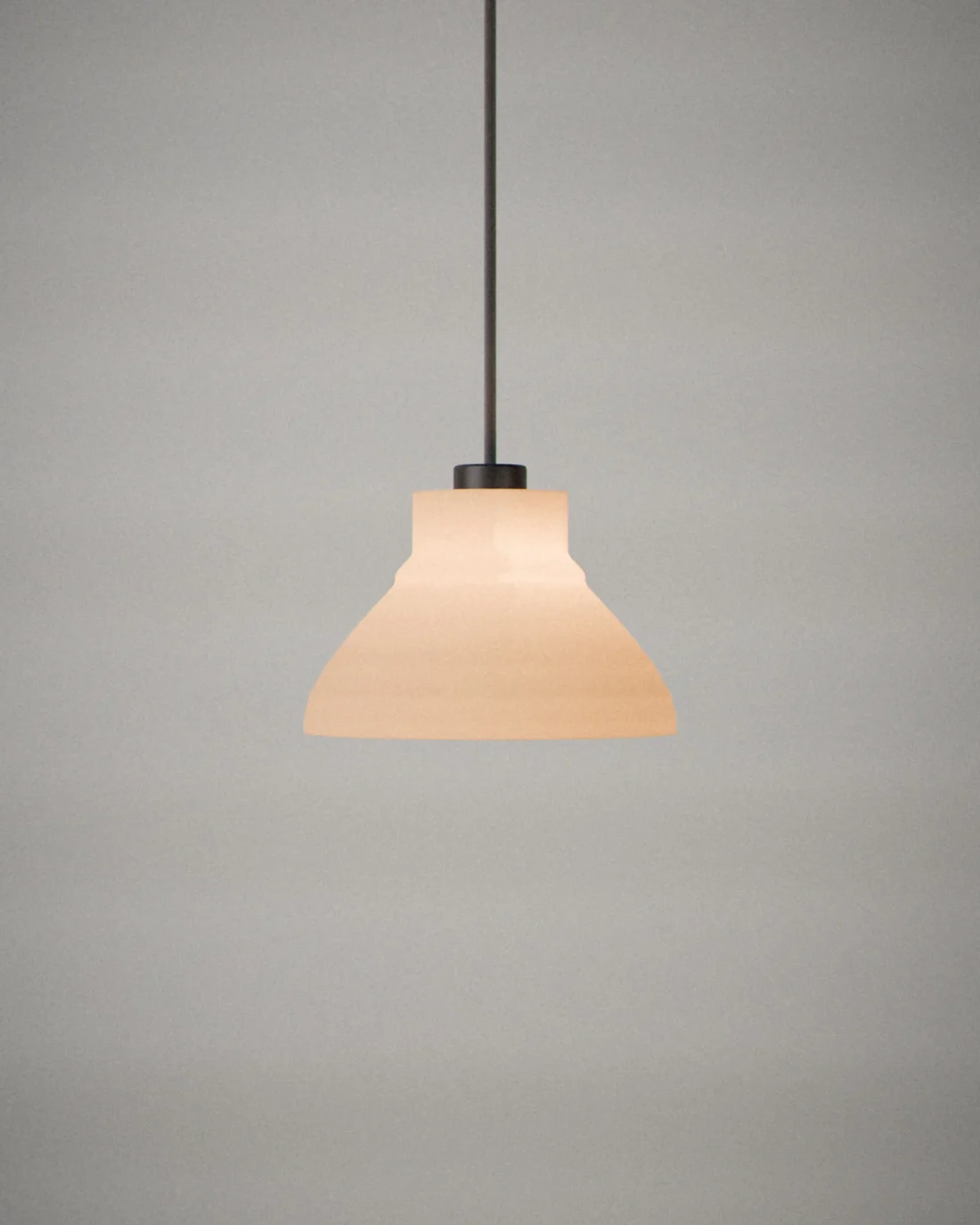 Hachi pendant light, on a plain grey backdrop