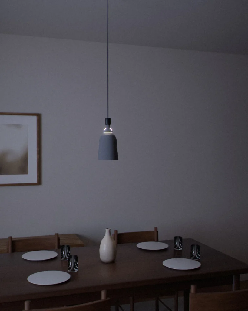 Handbell lit in a furnished room in the evening