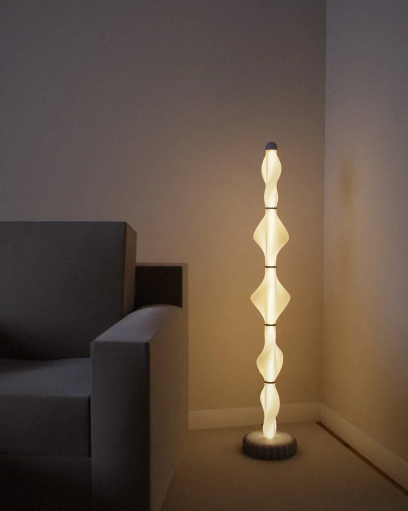 Helix lit in a furnished room in the evening
