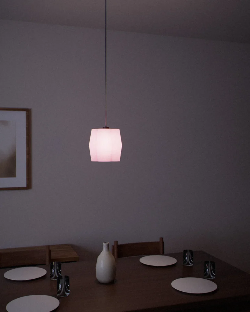 Kikyō lit in a furnished room in the evening