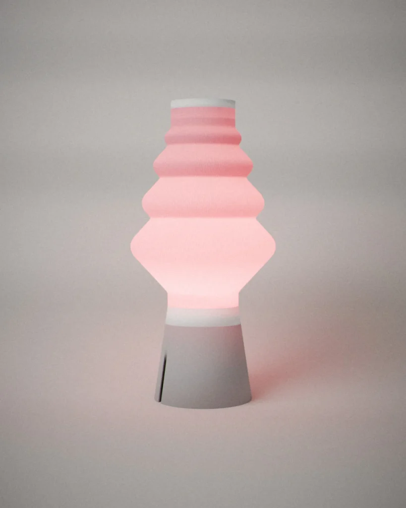Kumo, lit, on a pale grey wall