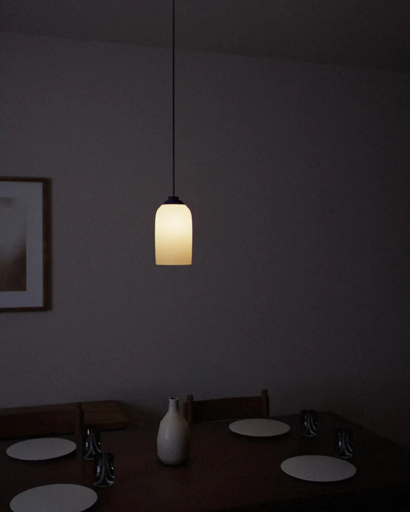 Lozenge lit in a furnished room in the evening