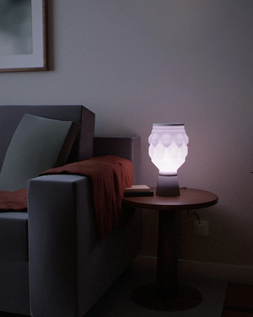 Pills lit in a furnished room in the evening