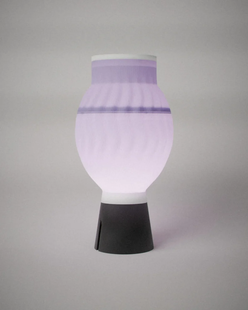 Ripple, lit, on a pale grey wall