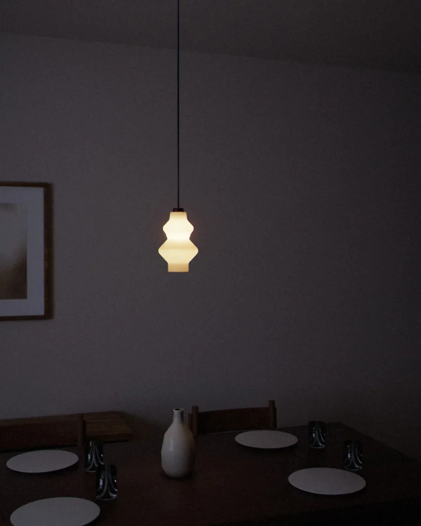Tiers lit in a furnished room in the evening