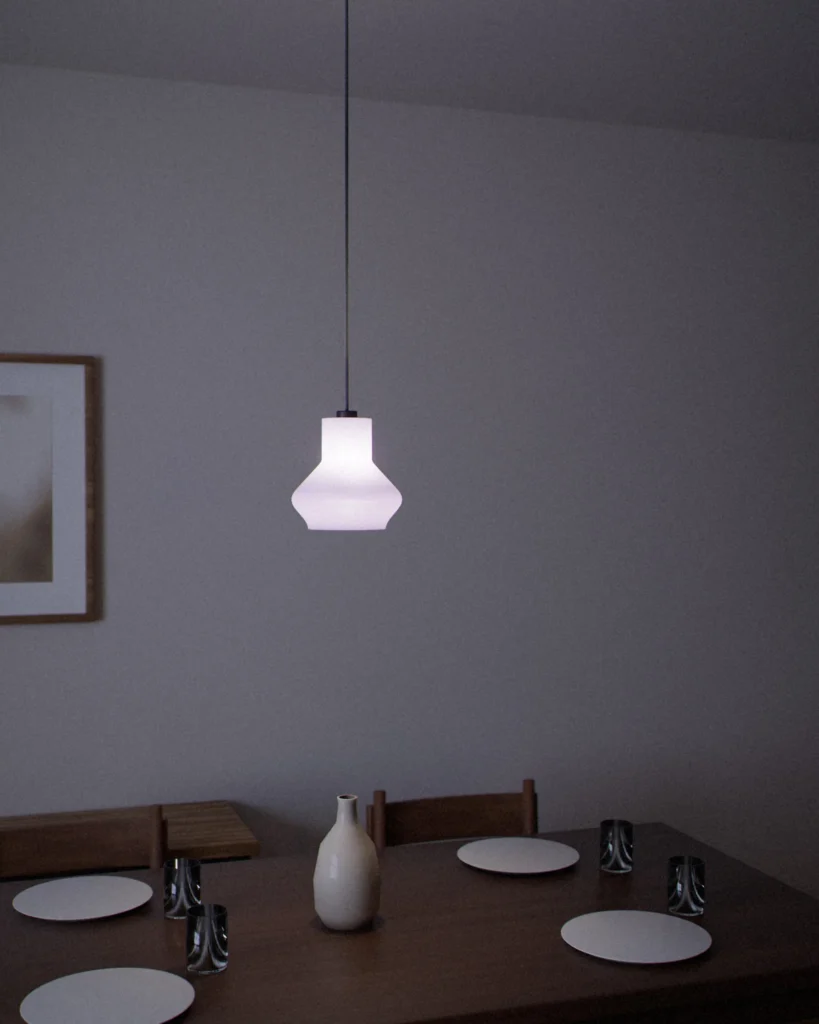 UFO lit in a furnished room in the evening
